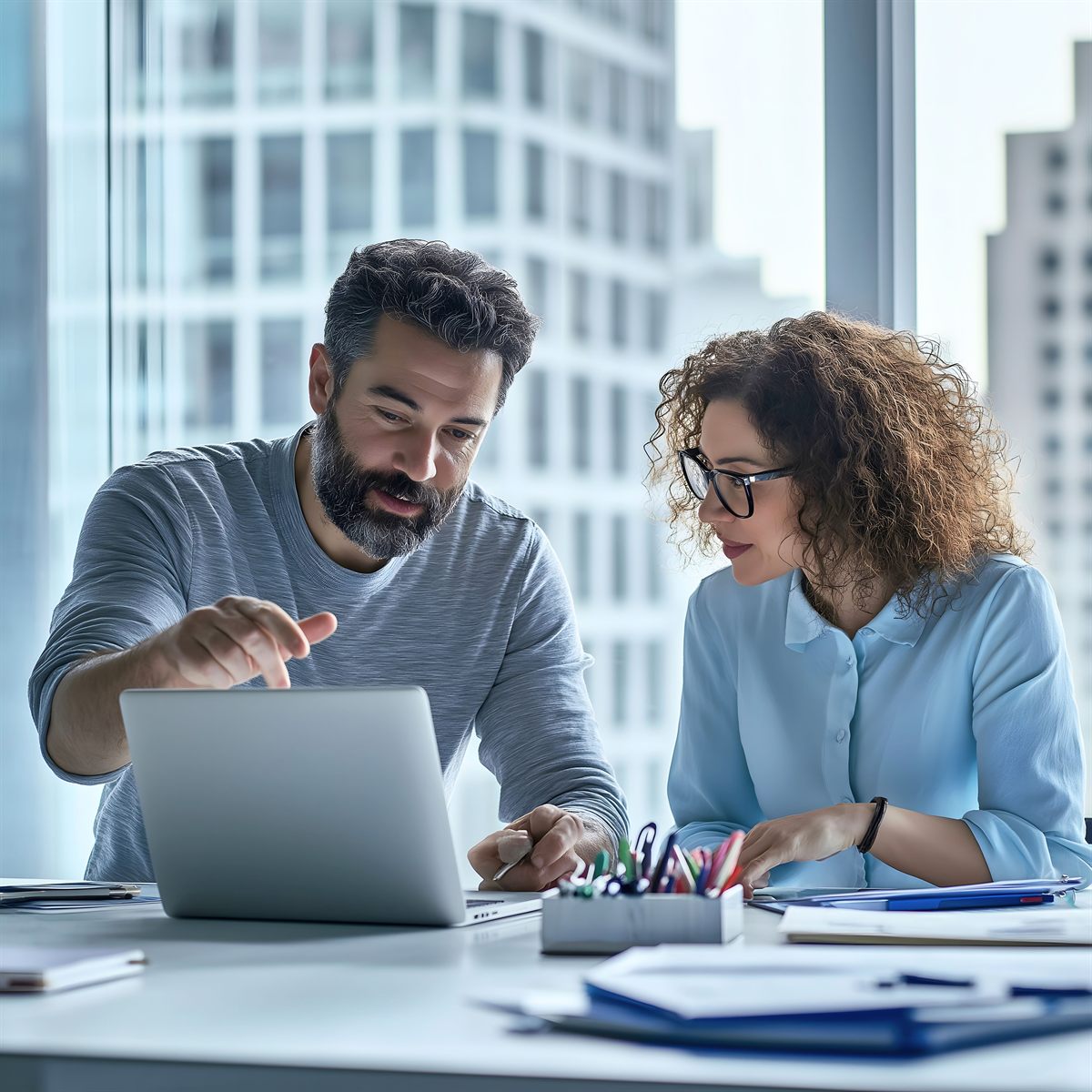 Local consultant reviewing AI results with a small business owner.
